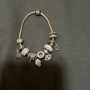 Pandora bracelet with all charms.